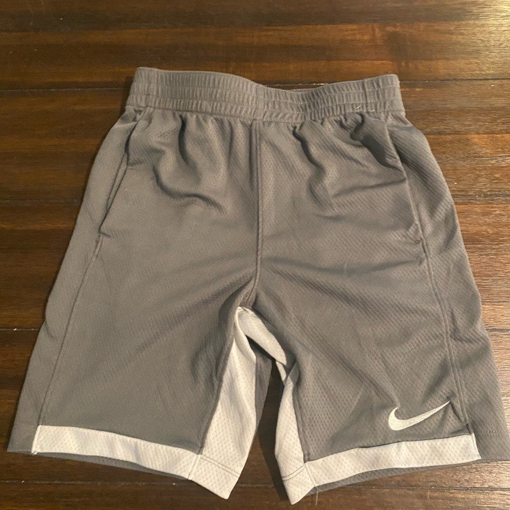 Grey Nike Dri-Fit boy’s shorts, size Medium